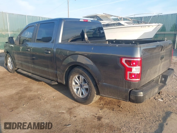 2018 Ford F-150 XL with VIN 1FTEW1E53JFD33161, listed as a IAAI auction lot 41796374 with 64,910 mi miles. Bid and sale history available at carsss.com. Image 3.