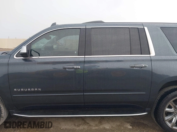 2020 Chevrolet Suburban Premier with VIN 1GNSCJKC8LR290783, listed as a IAAI auction lot 42636126 with 59,371 mi miles and . Bid and sale history available at DreamBid. Image 14.
