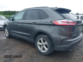 2020 Ford Edge SE z VIN 2FMPK4G94LBB18927, wystawiony jako IAAI lot #42332042 z przebiegiem 86 720 mil mil oraz . Historia ofert i sprzedaży dostępna na DreamBid. Obrazek 3.