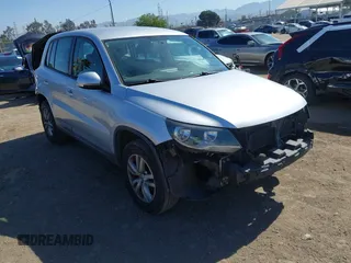 2013 Volkswagen Tiguan S with VIN WVGAV3AX2DW603775, listed as a IAAI auction lot 42325274 with 165,062 mi miles and . Bid and sale history available at DreamBid. Image 1.
