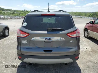 2014 Ford Escape SE с VIN 1FMCU9G90EUC19255, выставлен на аукционе Copart как лот 57267775 с пробегом 102 924 миль миль и Списание • Salvage title. История ставок и продаж доступна на DreamBid. Изображение 6.