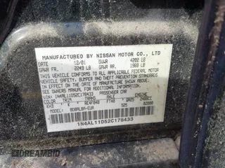 2002 Nissan Altima S with VIN 1N4AL11D52C178433, listed as a IAAI auction lot 41792610 with 216,659 mi miles. Bid and sale history available at carsss.com. Image 9.