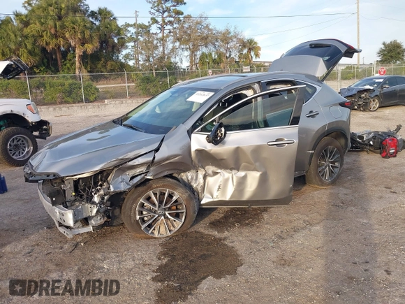 2023 Lexus NX with VIN 2T2GGCEZ0PC026760, listed as a IAAI auction lot 41242637 with 25,300 mi miles. Bid and sale history available at carsss.com. Image 2.