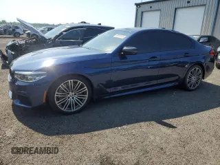2020 BMW 5 Series M550i xDrive with VIN WBAJS7C0XLBN96338, listed as a Copart auction lot 60591815 with 73,910 mi miles and Salvage title. Bid and sale history available at DreamBid. Image 1.