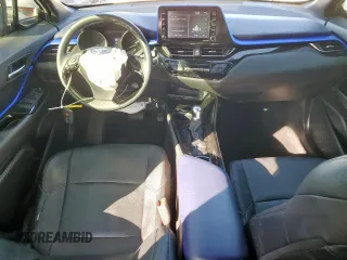 2020 Toyota C-HR LE z VIN JTNKHMBX9L1077558, wystawiony jako Copart lot #53603615 z przebiegiem 61 254 mil mil oraz Szkoda całkowita • Salvage title. Historia ofert i sprzedaży dostępna na DreamBid. Obrazek 8.
