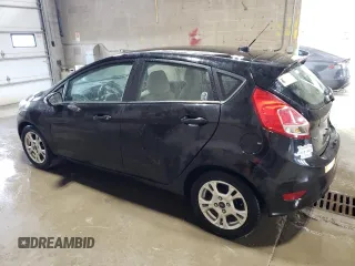 2014 Ford Fiesta SE z VIN 3FADP4EJ7EM145326, wystawiony jako Copart lot #62030855 z przebiegiem 83 625 mil mil oraz Czysty tytuł • Clean title. Historia ofert i sprzedaży dostępna na DreamBid. Obrazek 2.