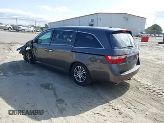 2013 Honda Odyssey EX-L with VIN 5FNRL5H62DB035649, listed as a IAAI auction lot 41849123 with 176,392 mi miles and . Bid and sale history available at carsss.com. Image 3.