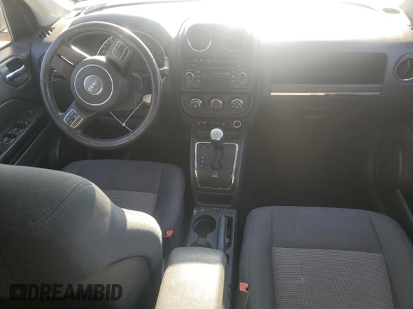 2012 Jeep Compass Latitude with VIN 1C4NJDEB4CD537763, listed as a Copart auction lot 84878244 with 198,582 mi miles and Clean Title. Bid and sale history available at DreamBid. Image 8.