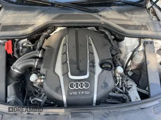 2017 Audi A8 Sport z VIN WAU43AFD7HN005619, wystawiony jako Copart lot #57526015 z przebiegiem 57 262 mil mil oraz Szkoda całkowita • Salvage title. Historia ofert i sprzedaży dostępna na DreamBid. Obrazek 7.