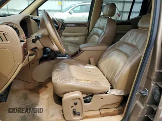 2003 GMC Envoy XL SLT with VIN 1GKES16S436174478, listed as a Copart auction lot 63319844 with 0 mi miles and Salvage Title. Bid and sale history available at carsss.com. Image 7.