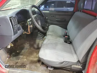 1995 Nissan Frontier with VIN 1N6SD11S6SC434201, listed as a Copart auction lot 60198815 with 222,938 mi miles and Salvage title. Bid and sale history available at DreamBid. Image 7.