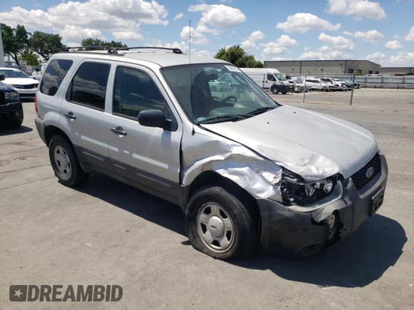 2007 Ford Escape XLS z VIN 1FMYU02Z97KC06172, wystawiony jako Copart lot #56978575 z przebiegiem 155 456 mil mil oraz Szkoda całkowita • Salvage title. Historia ofert i sprzedaży dostępna na DreamBid. Obrazek 4.