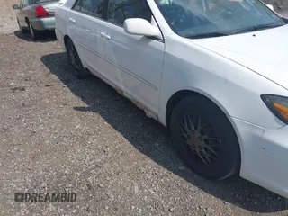 2003 Toyota Camry LE with VIN JTDBE32K830222476, listed as a IAAI auction lot 42160720 with 161,570 mi miles and . Bid and sale history available at DreamBid. Image 14.
