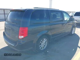 2014 Dodge Grand Caravan SXT with VIN 2C4RDGCG1ER167624, listed as a IAAI auction lot 41888822 with 202,729 mi miles and . Bid and sale history available at DreamBid. Image 4.