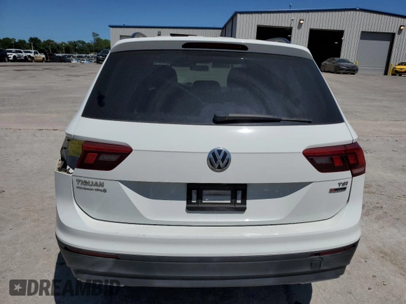 2018 Volkswagen Tiguan S with VIN 3VV0B7AX7JM065958, listed as a Copart auction lot 57598015 with 97,360 mi miles and Salvage title. Bid and sale history available at DreamBid. Image 6.