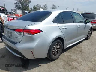 2022 Toyota Corolla Hybrid LE with VIN JTDEAMDE6NJ056705, listed as a IAAI auction lot 42032119 with 197,030 mi miles. Bid and sale history available at carsss.com. Image 4.