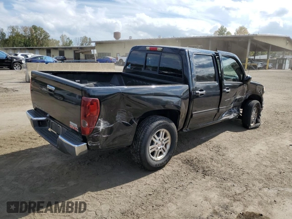 2011 GMC Canyon SLE1 with VIN 1GTH6MFE8B8102114, listed as a Copart auction lot 74137234 with 150,598 mi miles and Salvage title. Bid and sale history available at DreamBid. Image 3.