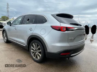 2017 Mazda CX-9 Grand Touring with VIN JM3TCADY7H0136915, listed as a Copart auction lot 57106855 with 135,872 mi miles and Clean title. Bid and sale history available at DreamBid. Image 3.