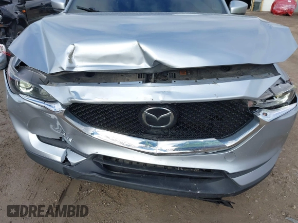 2020 Mazda CX-5 Touring with VIN JM3KFACM5L0768371, listed as a IAAI auction lot 41862623 with 138,446 mi miles and . Bid and sale history available at carsss.com. Image 6.