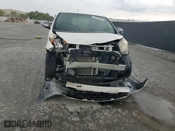 2013 Scion iQ with VIN JTNJJXB01DJ022687, listed as a Copart auction lot 61918195 with 117,483 mi miles and Salvage title. Bid and sale history available at DreamBid. Image 13.