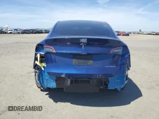 2024 Tesla Model Y Long Range z VIN 7SAYGAEE3RF034699, wystawiony jako Copart lot #54523815 z przebiegiem 9 764 mil mil oraz Szkoda całkowita • Salvage title. Historia ofert i sprzedaży dostępna na DreamBid. Obrazek 6.