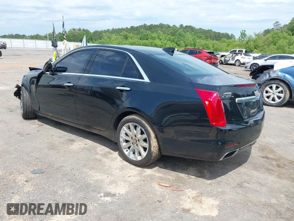 2016 Cadillac CTS AWD with VIN 1G6AW5SX7G0129019, listed as a IAAI auction lot 42148335 with 86,023 mi miles and . Bid and sale history available at DreamBid. Image 3.