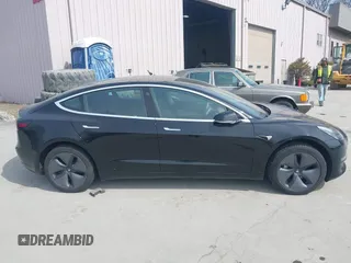 2020 Tesla Model 3 Standard Range Plus with VIN 5YJ3E1EAXLF643807, listed as a IAAI auction lot 41789406 with 49,256 mi miles. Bid and sale history available at carsss.com. Image 12.