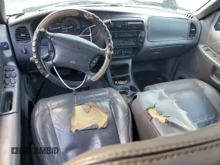 1999 Ford Explorer XLT z VIN 1FMZU32E4XUA16402, wystawiony jako Copart lot #85243074 z przebiegiem 148 110 mil mil oraz Szkoda całkowita • Salvage title. Historia ofert i sprzedaży dostępna na DreamBid. Obrazek 8.