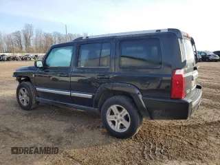 2010 Jeep Commander Limited with VIN 1J4RG5GT6AC113462, listed as a Copart auction lot 82400044 with 189,168 mi miles and Salvage title. Bid and sale history available at DreamBid. Image 2.