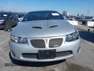 2005 Pontiac GTO with VIN 6G2VX12U05L369686, listed as a IAAI auction lot 41975716 with 64,893 mi miles. Bid and sale history available at carsss.com. Image 12.