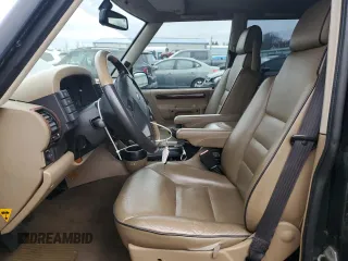 2000 Land Rover Discovery Cloth with VIN SALTY1248YA253836, listed as a Copart auction lot 47256475 with 118,345 mi miles and Salvage Title. Bid and sale history available at DreamBid. Image 7.