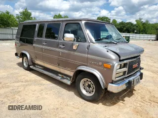 1993 GMC Vandura z VIN 1GDEG25KXPF515257, wystawiony jako Copart lot #56179665 z przebiegiem 308 324 mil mil oraz Szkody całkowita. Historia ofert i sprzedaży dostępna na DreamBid. Obrazek 4.