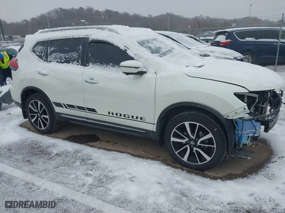 2017 Nissan Rogue SL with VIN 5N1AT2MV9HC792104, listed as a IAAI auction lot 40991192 with 82,393 mi miles. Bid and sale history available at carsss.com. Image 1.