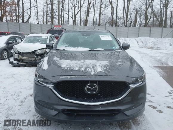 2019 Mazda CX-5 Touring with VIN JM3KFBCM7K0583582, listed as a IAAI auction lot 41634349 with 33,709 mi miles. Bid and sale history available at carsss.com. Image 13.