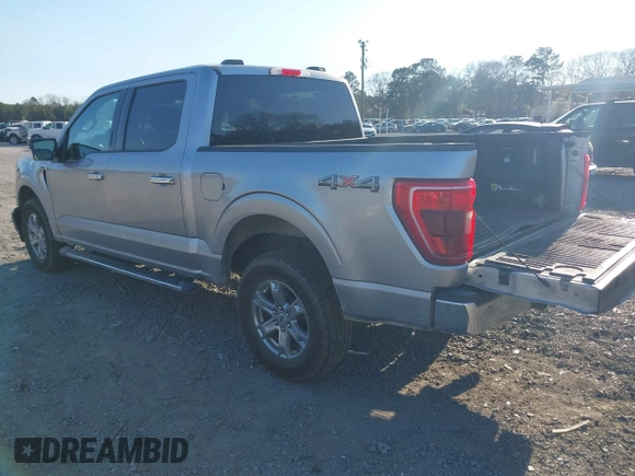 2021 Ford F-150 XL with VIN 1FTFW1E58MFA73753, listed as a IAAI auction lot 41707310 with 138,450 mi miles. Bid and sale history available at carsss.com. Image 3.