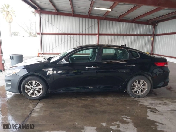 2016 Kia Optima LX with VIN 5XXGT4L34GG117088, listed as a IAAI auction lot 41681175 with 152,482 mi miles. Bid and sale history available at carsss.com. Image 14.