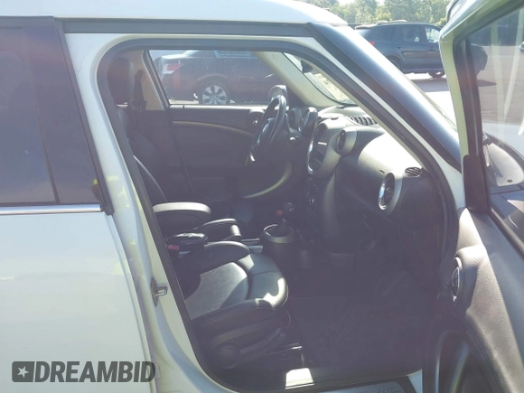 2012 MINI Countryman S with VIN WMWZC3C56CWL82122, listed as a IAAI auction lot 42600474 with 71,920 mi miles and . Bid and sale history available at DreamBid. Image 5.