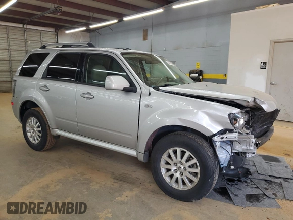 2009 Mercury Mariner Premier z VIN 4M2CU87GX9KJ17731, wystawiony jako Copart lot #54204855 z przebiegiem 54 521 mil mil oraz Szkody całkowita. Historia ofert i sprzedaży dostępna na DreamBid. Obrazek 4.