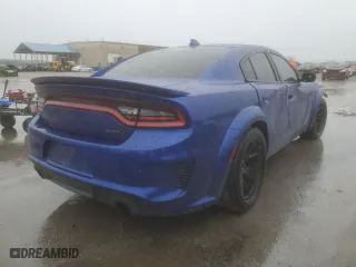 2021 Dodge Charger SRT Hellcat Redeye Widebody with VIN 2C3CDXL9XMH649508, listed as a Copart auction lot 82648834 with 8,849 mi miles and Salvage Title. Bid and sale history available at carsss.com. Image 3.