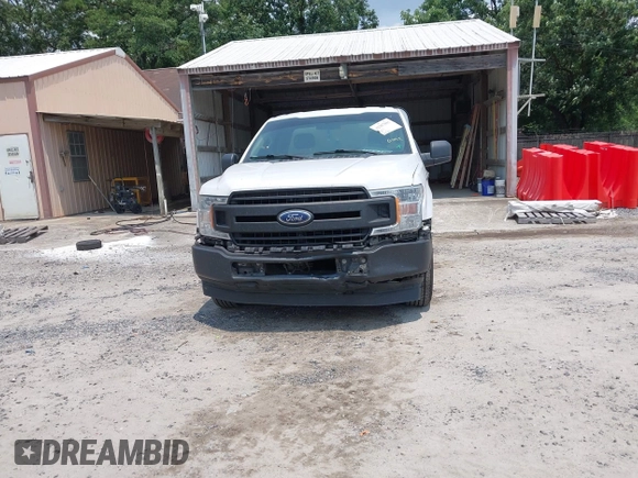 2018 Ford F-150 XL with VIN 1FTMF1CB3JKE51738, listed as a IAAI auction lot 42387561 with 110,951 mi miles and . Bid and sale history available at DreamBid. Image 6.