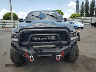 2016 Ram 1500 Rebel z VIN 1C6RR7YT0GS336788, wystawiony jako Copart lot #58507795 z przebiegiem Nie podano mil oraz Szkody całkowita. Historia ofert i sprzedaży dostępna na DreamBid. Obrazek 5.