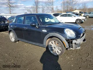 2015 MINI Cooper Hardtop 4 Door S with VIN WMWXU3C57FT892389, listed as a Copart auction lot 44304325 with 91,697 mi miles and Salvage Title. Bid and sale history available at carsss.com. Image 4.