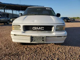 1995 GMC Sonoma SLS z VIN 1GTCS1948S8533169, wystawiony jako Copart lot #58241305 z przebiegiem 192 037 mil mil oraz Tytuł czysty. Historia ofert i sprzedaży dostępna na DreamBid. Obrazek 5.