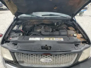2000 Ford F-150 XL with VIN 1FTZX1721YNC09536, listed as a Copart auction lot 52645405 with 120,638 mi miles and Salvage Title. Bid and sale history available at carsss.com. Image 11.