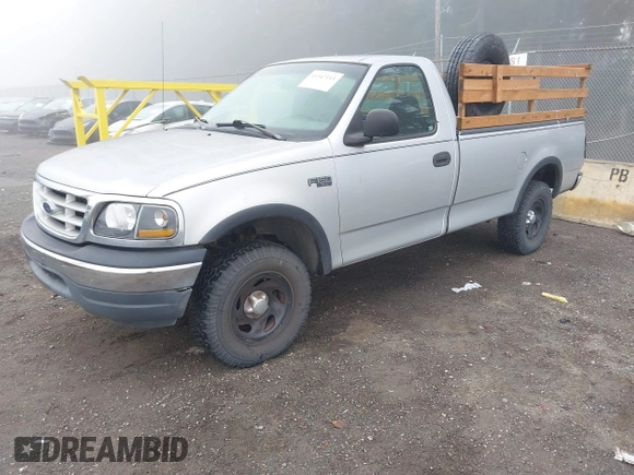1999 Ford F-150 with VIN 2FTZF1828XCA85643, listed as a IAAI auction lot 41347113 with 173,813 mi miles and . Bid and sale history available at DreamBid. Image 2.