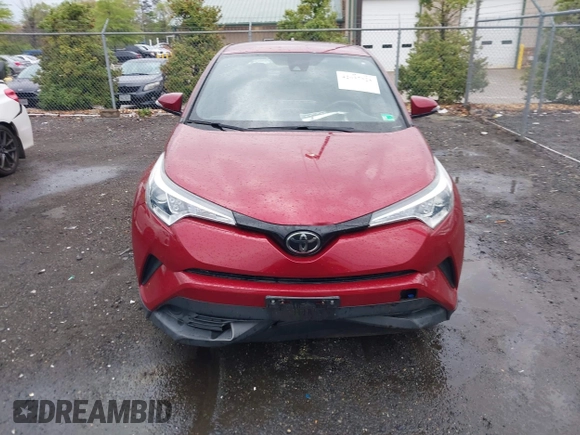 2019 Toyota C-HR XLE with VIN NMTKHMBX0KR088761, listed as a IAAI auction lot 42037328 with 28,501 mi miles and . Bid and sale history available at DreamBid. Image 12.