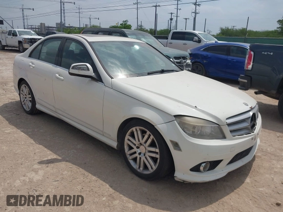 2009 Mercedes-Benz C-Class 3.0L Sport with VIN WDDGF54X39F200565, listed as a IAAI auction lot 42077156 with 169,248 mi miles. Bid and sale history available at carsss.com. Image 1.