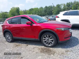 2021 Mazda CX-5 Grand Touring with VIN JM3KFBDM3M0434569, listed as a IAAI auction lot 42422349 with 25,924 mi miles and . Bid and sale history available at DreamBid. Image 13.