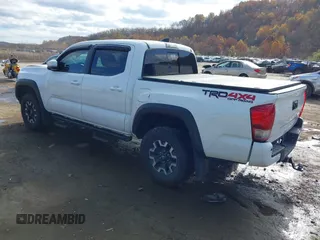 2017 Toyota Tacoma SR5 with VIN 3TMCZ5AN8HM063513, listed as a IAAI auction lot 40703177 with 42,323 mi miles and . Bid and sale history available at carsss.com. Image 3.