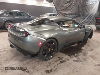 2013 Lotus Evora z VIN SCCLMDSU7DHA10025, wystawiony jako IAAI lot #41298776 z przebiegiem 18 194 mil mil oraz . Historia ofert i sprzedaży dostępna na DreamBid. Obrazek 4.